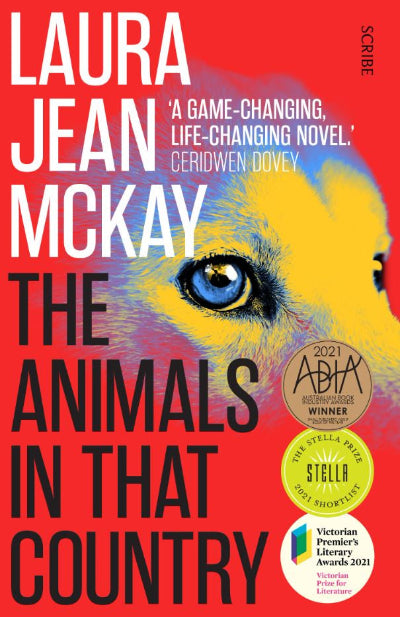 Book cover of 'The Animals in That Country' by Laura Jean McKay with a colorful animal illustration on a red background.